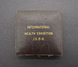 1884 International Health Exhibition Cased Bronze Medal - By Wyon
